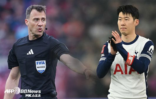 펠릭스 츠바이어 심판과 손흥민. 사진=AFPBBNews=News1