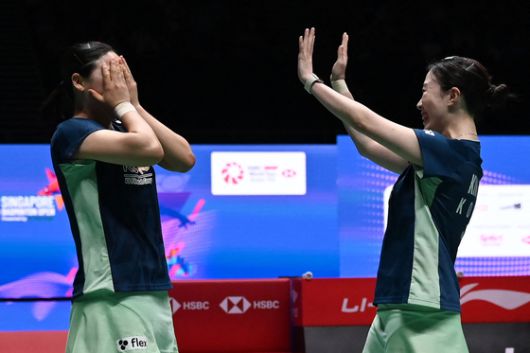우승이 확정되자 환호하는 김혜정-공희용 조. AFP=연합뉴스