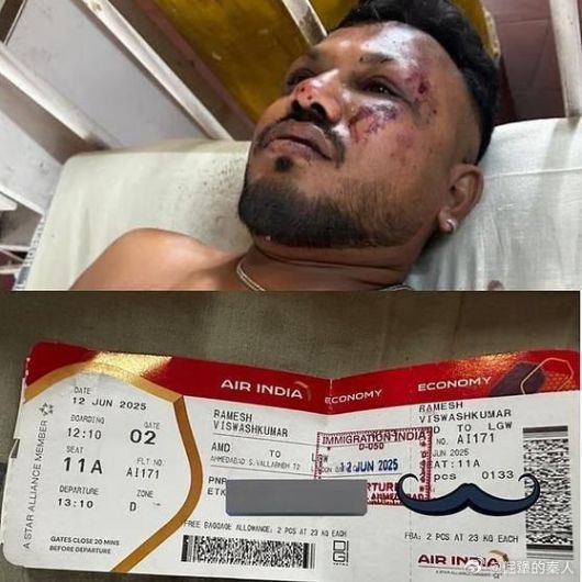 12일(현지시간) 인도 아메다바드의 한 공항에서 런던 개트윅 공항으로 향하던 에어 인디아 항공기가 이륙 중 추락했다. 한 행인이 추락 현장을 지나고 있다. 로이터=연합뉴스