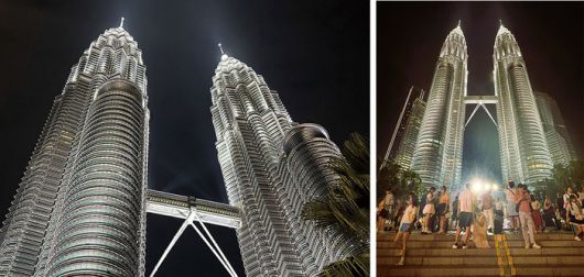 세계에서 가장 높은 쌍둥이 빌딩인 ‘페트로나스 트윈 타워’를 배경으로  인생샷을 찍는 관광객들의 모습