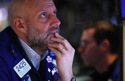 20일(현지시간) 미국 뉴욕증권거래소(NYSE) 거래장에서 트레이더가 업무를 보고 있다. AFP연합뉴스