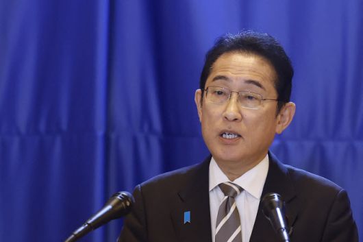 Japan‘s Prime Minister Fumio Kishida addresses a press conference during a visit to Qatar on July 18, 2023, as he wraps up a Gulf tour centred on energy security and cooperation with Tokyo’s main suppliers. (Photo by KARIM JAAFAR / AFP)