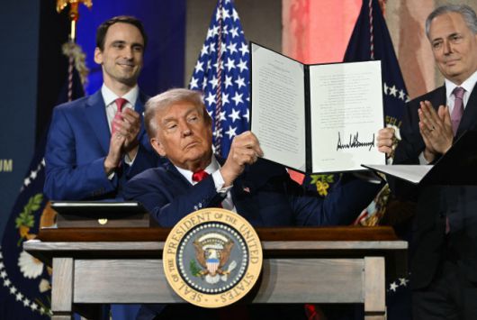 지난해 7월 AI 행정명령에 서명한 도널드 트럼프 대통령.(사진=AFP)