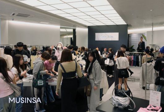 Japanese customers shop at the Matin Kim store, which opened in Shibuya, Tokyo on April 24. /Courtesy of Musinsa