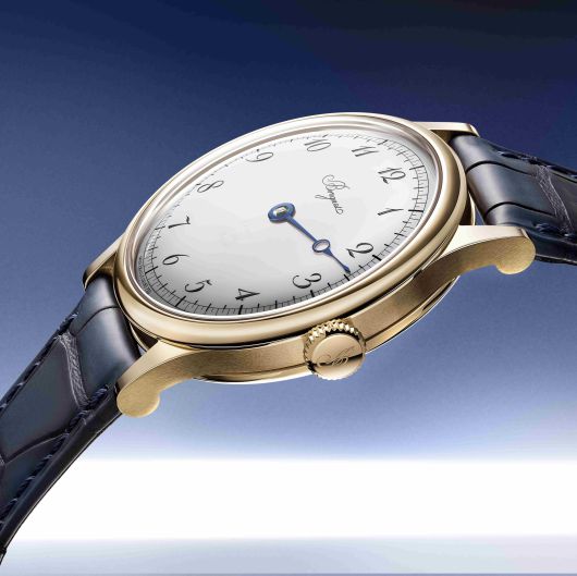 브레게 창립 250주년을 맞아 선보인 ‘클래식 서브스크립션 2025’. 화이트 에나멜 다이얼 위에 단 한 개의 핸즈만을 둔 미니멀 디자인이 고요하지만 압도적인 존재감을 발산한다.  브레게.