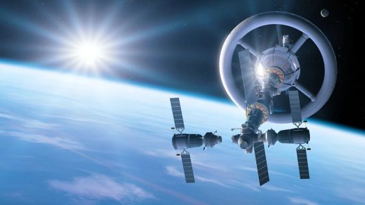 인공 중력을 만들어내는 우주선을 상상해서 그려낸 그림. 인공중력 우주선은 이처럼 거대한 바퀴를 돌리면서 중력과 비슷한 힘을 만들어낸다. 인공중력 우주정거장이 만들어진다면 역시 이와 유사한 형태로 지어질 것으로 전망된다. /Science Photo Library