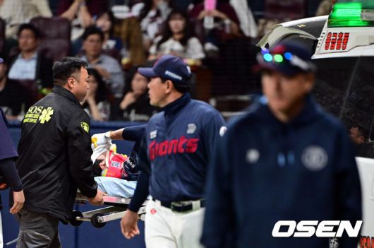 [OSEN=고척, 조은정 기자]29일 오후 서울 고척스카이돔에서 ‘2025 신한 SOL BANK KBO리그’  키움 히어로즈와 롯데 자이언츠의 경기가 진행됐다.이날 경기에서 키움은 김윤하를, 롯데는 반즈를 선발투수로 내세웠다.7회초 1사 1,2루 롯데 전민재가 키움 양지율에게 헤드샷을 맞은 뒤 구급차로 이송되고 있다.  2025.04.29 /cej@osen.co.kr