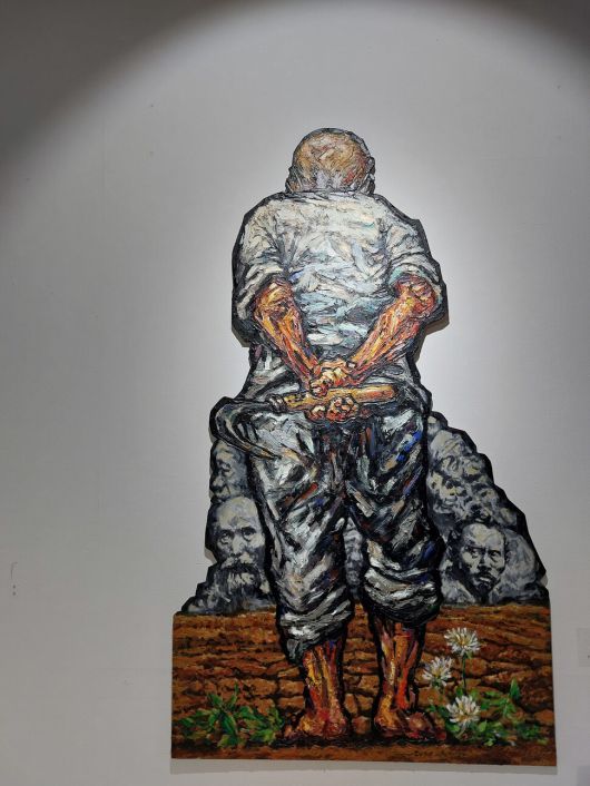 은암미술관에 마련된 36회 오월전의 주요 출품작 가운데 하나인 울산 지역 작가 송주웅씨의 올해 신작 ‘낫을 벼리고’. 노형석 기자