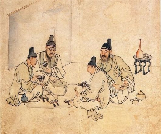 조선 후기 문인화가 김득신의 ‘밀희투전’. 노름하는 사내 중 안경을 쓴 이가 보인다. 18세기 들어 안경은 상민 계층까지 널리 보급됐다. 간송미술문화재단 소장