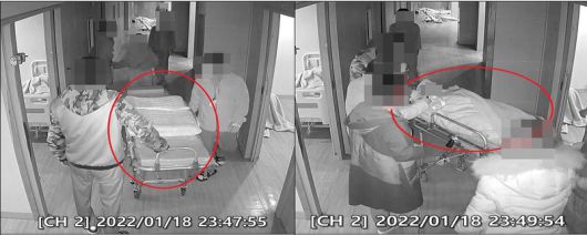 2022년 1월18일 반구대병원 폭행·사망 피해자 김도진씨(가명, 사망 당시 32살)를 옮기기 위해 응급이송을 위한 이동용 침상이 병실 앞에 도착해 김씨를 싣고 있다. 이날 간호사는 저녁 9시44분 처음으로 모습을 드러낸 이후 두 시간 동안 아무런 응급조치를 하지 않았다. 인권위 사건 조사결과보고서에 첨부된 사진이다.