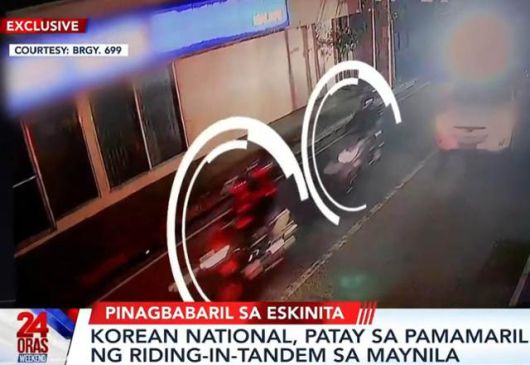 지난 3월 필리핀 마닐라 말라테구 길거리에서 한국인 A씨에게 총격을 가한 강도 4명이 오토바이 2대(흰색 원 안)에 나눠 타고 달아나는 모습이 현지 CCTV에 찍혔다. GMA뉴스 유튜브 캡처.
