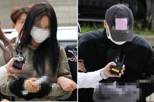 한국 축구대표팀 주장 손흥민의 아이를 임신했다고 주장하며 손씨에게 돈을 뜯어내려 한 20대 여성 양모(왼쪽)씨와 40대 남성 용모씨가 17일 영장실질심사를 받기 위해 서울중앙지법에 들어서고 있다. 연합뉴스