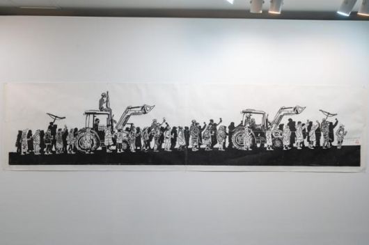 민주화운동기념관 특별전 '빛의 연대기'에 전시된 박경훈의 목판화 '동학, 일백삼십년만에 남태령을 넘다'. 민주화운동기념사업회 제공