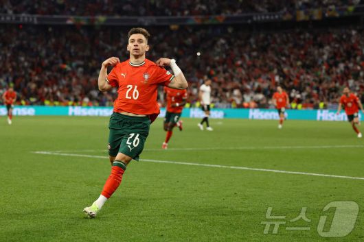 포르투갈의 프란시스코 콘세이상이 5일(한국시간) 열린 2024-25 UEFA 네이션스리그 4강 독일전에서 후반 18분 동점골을 넣은 뒤 기뻐하고 있다. ⓒ AFP=뉴스1
