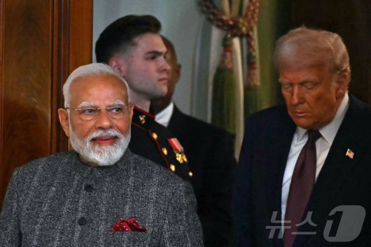 도널드 트럼프 미국 대통령이 13일(현지시간) 워싱턴 백악관에서 나렌드라 모디 인도 총리와 회담을 마친 뒤 기자회견에 도착을 하고 있다. 2025.02.14 ⓒ AFP=뉴스1 ⓒ News1 우동명 기자
