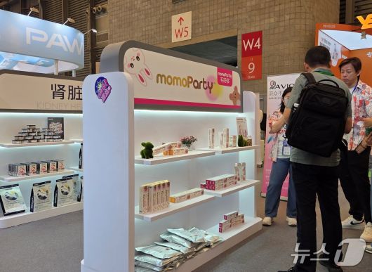 22일 중국 상해에서 열린 '펫페어 아시아'에 설치된 신겐 부스. ⓒ 뉴스1