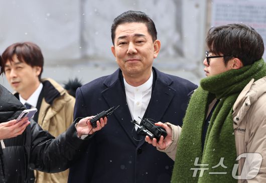 김병기 더불어민주당 전 원내대표가 12일 서울 여의도 민주당사에서 열리는 윤리심판원 회의에 출석하고 있다. 2026.1.12/뉴스1 ⓒ News1 김도우 기자