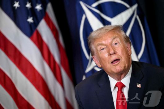 21일(현지시간) 도널드 트럼프 미국 대통령이 스위스 다보스의 세계경제포럼(WEF) 행사장에서 열린 마르크 뤼터 북대서양조약기구(NATO·나토) 사무총장과의 회담 중 발언하고 있다. 2026.01.21 ⓒ AFP=뉴스1 ⓒ News1 김지완 기자