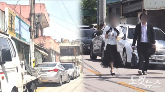 27일 전북 익산시 창인동 신천지 익산교회 인근. 교회 앞 주황색 실선이 그려진 곳에 주차중인 차와 인근 주차가 금지된 도로에 주차를 한 뒤 집회에 참여하기 위해 나서는 신도들. 심동훈 기자