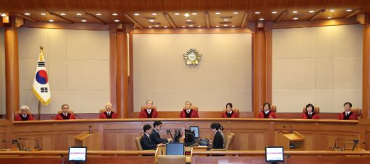 18일 서울 종로구 헌법재판소에서 열린 조지호 경찰청장 탄핵심판 선고기일에 김상환 헌법재판소장를 포함한 헌법재판관들이 착석해 있다. 연합뉴스