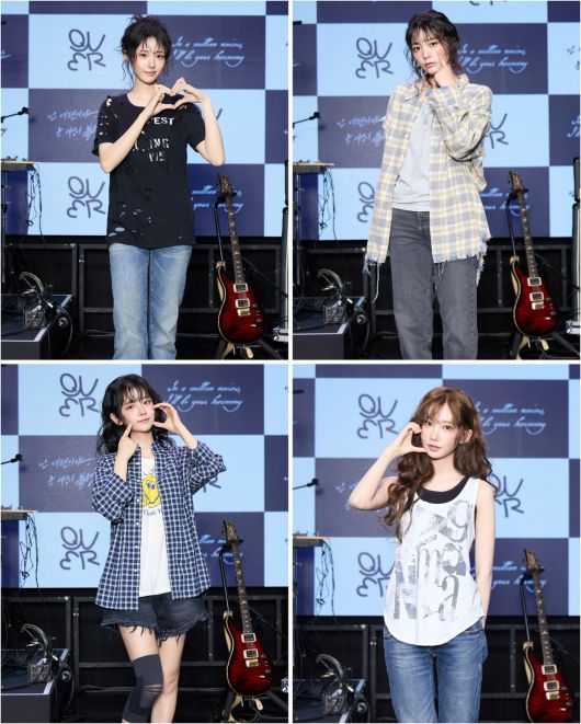 밴드 QWER이 9일 서울 서대문구 예스24 원더로크홀에서 열린 미니 3집 '난 네 편이야, 온 세상이 불협일지라도' 발매 기념 쇼케이스에서 포즈를 취하고 있다. 왼쪽부터 시계방향으로 히나, 시연, 쵸단, 마젠타. 타마고 프로덕션 제공.