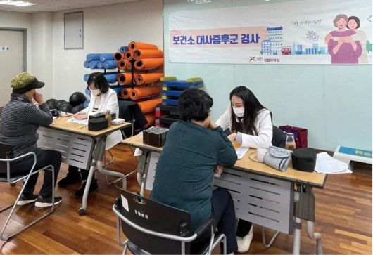 관내 장애인복지시설인 정립회관에서 출장검진을 진행하는 모습. 광진구 제공