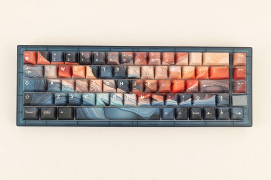 67키 레이아웃에 방향키는 남긴 구성