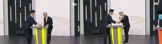 권영국 민주노동당 대선 후보가 전날 첫 TV 토론회가 끝난 뒤 김문수 국민의힘 대선후보의 악수 요청을 거절하는 모습. 〈사진=JTBC 자료화면 캡처〉