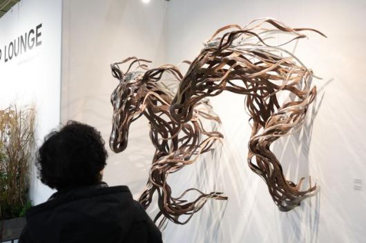 A visitor views sculptures at the Seoul International Sculpture Festa 2026 at COEX in Gangnam, Seoul, Jan. 14, 2026.