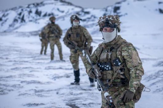 This Jan. 18, 2025 Hand Out image taken by the Danish Defence Forces show Danish soldiers during shooting practice at an undisclosed location in Greenland. AFP-Yonhap