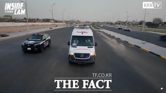 선수단 버스를 경호하는 이라크 경찰./KFATV