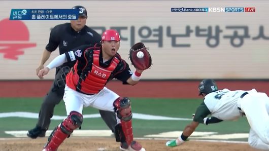 30일 수원케이티위즈파크에서 열린 2025 KBO리그 KIA와 KT의 경기에서 2회말 KT 3루 주자 유준규가 홈으로 쇄도할 때 KIA 포수 한준수가 태그를 위해 포구하고 있다. 사진 | 티빙