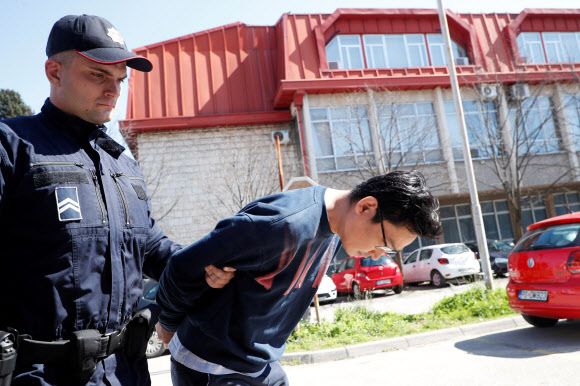 권도형 대표와 함께 체포돼 24일(현지시간) 같은 법원에 출두하는 한모 씨. 포드고리차 로이터 연합뉴스