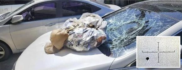 폭탄 같은 ‘北 오물풍선’ - 북한이 ‘대남 오물풍선’ 살포 도발을 재개한 가운데 2일 경기 안산시 단원구의 한 빌라 주차장에 북한의 오물풍선으로 추정되는 물체가 떨어져 차량의 앞 유리가 파손됐다(큰 사진). 작은 사진은 이날 우리 군 당국의 탐지장비에 포착된 북한의 대남 오물풍선. 합동참모본부 제공·뉴스1