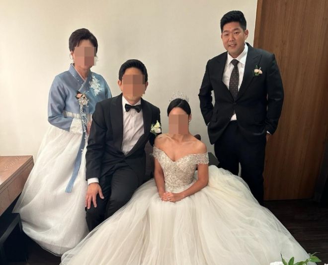 김태흠씨가 참석한 동생 결혼식 사진. 연합뉴스