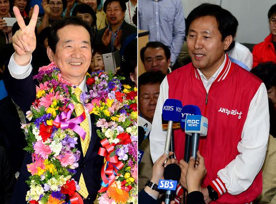 2016년 4월 13일 20대 총선 정치 1번지 종로에서 당선된 정세균 더불어민주당 후보(왼쪽)가 서울 종로 자신의 선거사무소에서 꽃다발을 목에 걸고 손으로 승리의 V를 만들어 인사하고 있다. 이날 밤 오세훈 후보는 자신의 선거 사무소에서 낙선을 인정했다. /사진=뉴스1.