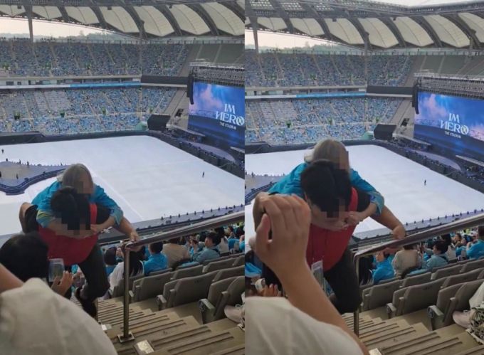 지난 25일 오후 서울 마포구에 위치한 서울월드컵경기장에서 열린 임영웅 콘서트에서 진행요원이 한 어르신 관객을 업고 계단을 오르는 모습. /사진=X(구 트위터)