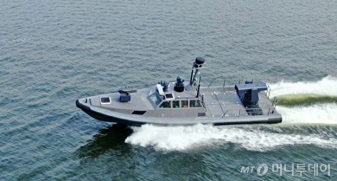 (서울=뉴스1) = LIG넥스원이 방위사업청과 ‘정찰용 무인수상정 체계개발사업’ 계약 체결을 완료했다. 미래 해양 무인체계의 핵심인 무인수상정 연구개발과 해군 유?무인 복합전투체계인 ‘네이비 씨 고스트(Navy Sea GHOST)’의 완성을 향한 의미있는 진전이다.  사진은 LIG넥스원의 무인수상정 해검3. (LIG넥스원 제공) 2024.12.19/뉴스1  Copyright (C) 뉴스1. All rights reserved. 무단 전재 및 재배포,  AI학습 이용 금지. /사진=(서울=뉴스1)