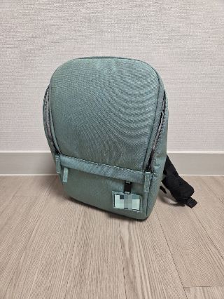 이 작은 어린이집 가방 하나에 수시로 옮겨 담는 젖병, 고리수건, 낮잠이불 등을 통해 어린이집과 무언의 대화가 오간다. /사진-최우영 기자