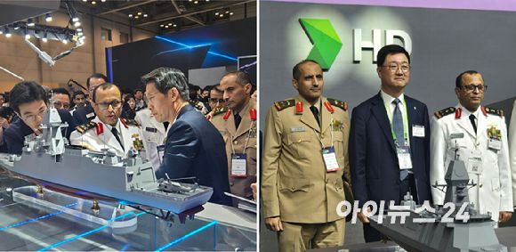 모하마드 알 가리비 사우디아라비아 해군참모총장을 비롯한 주요 군 고위 관계자들이 한화, HD현대 등 부스를 돌며 제품 설명을 듣고있다. [사진=최란 기자]