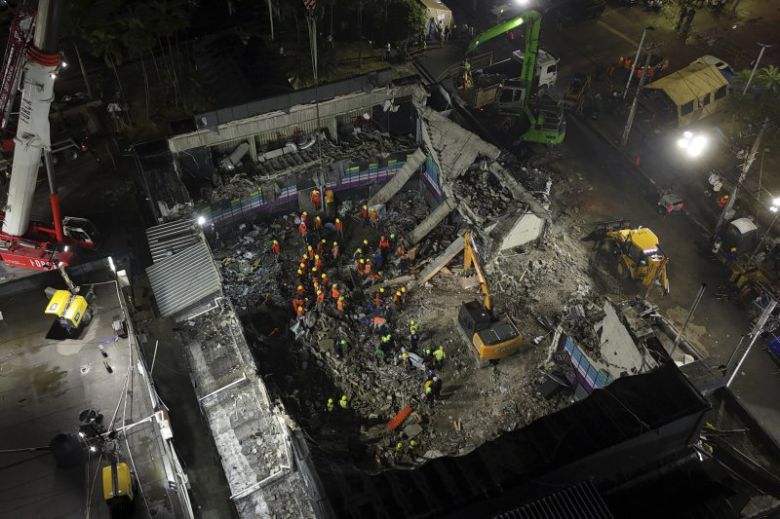 도미니카공화국 산토도밍고 제트세트 나이트클럽 지붕 붕괴 현장에서 구조대가 희생자 시신을 찾고 있다. 지난 8일 발생한 나이트클럽 사고로 인한 사망자 수는 최소 221명으로 늘어났다. AP 뉴시스