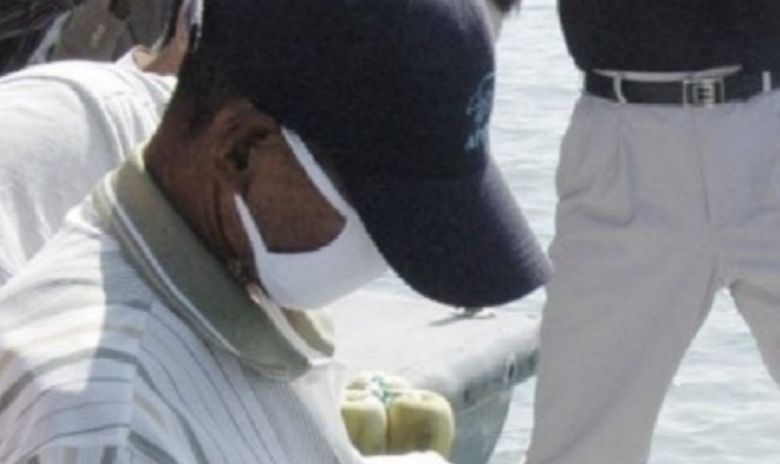 보성 어부 살인 사건 범인 오종근이 체포 직후 현장검증을 하고 있는 모습. 연합뉴스