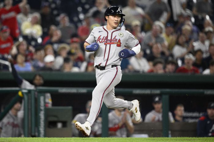 김하성이 6회 2루타를 치고 나간 뒤 드레이크 볼드윈의 적시타 때 홈으로 들어오고 있다. AP연합뉴스