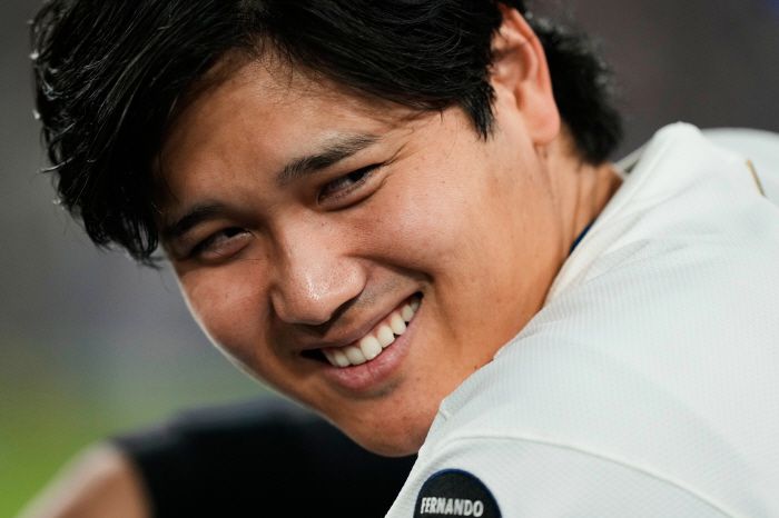 FILE - Los Angeles Dodgers' Shohei Ohtani smiles in the dugout during the fourth inning in Game 3 of baseball's National League Division Series against the Philadelphia Phillies, Wednesday, Oct. 8, 2025, in Los Angeles. (AP Photo/Mark J. Terrill, File) FILE PHOTO        <저작권자(c) 연합뉴스, 무단 전재-재배포, AI 학습 및 활용 금지>