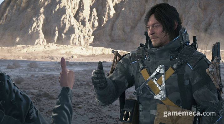 ▲ 엄지에 장착한 단말기를 사용한다 (사진: 게임메카 촬영)