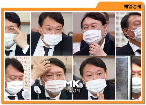 윤석열 검찰총장이 22일 서울 여의도 국회에서 열린 법제사법위원회의 대검찰청에 대한 국정감사에서 의원 질의에 다양한 표정으로 답변하고 있다. [김호영 기자]