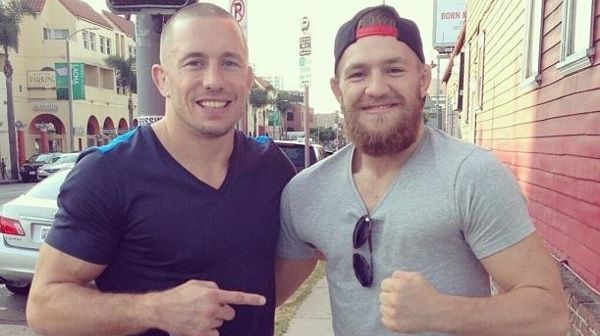 종합격투기 전설 조르주 생피에르(왼쪽)가 부진에 빠진 전 UFC 챔피언 코너 맥그리거(오른쪽)에게 ‘훈련과 인생을 바꿔야 한다’며 충고했다. 맥그리거가 UFC 챔피언 시절 생피에르와 만났다며 SNS에 공개한 사진.