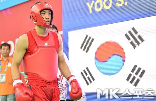 유상훈이 2014년 제17회 인천아시안게임 남자우슈 -70㎏ 결승전에 입장하고 있다. 사진=MK스포츠DB