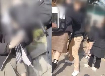 대낮 중학교 교문 앞에서 선배들이 신입생을 폭행하는 사건이 발생했다. [사진출처 = YTN 보도영상 캡처]