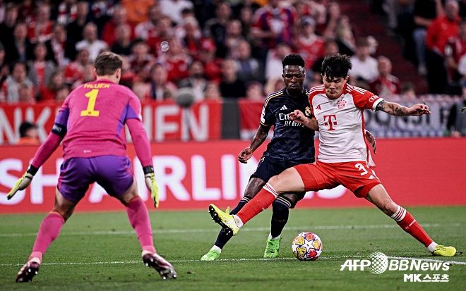 비니시우스 주니오르를 수비하는 김민재. 사진=ⓒAFPBBNews = News1